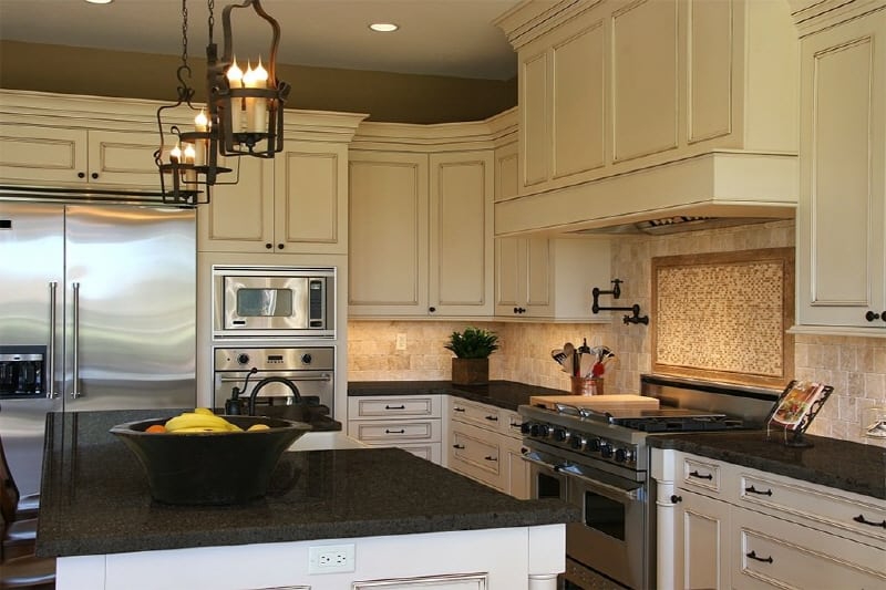 black kitchen counter and eggshell cabinets