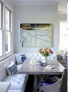 Beautiful Banquette Seating with a white couch